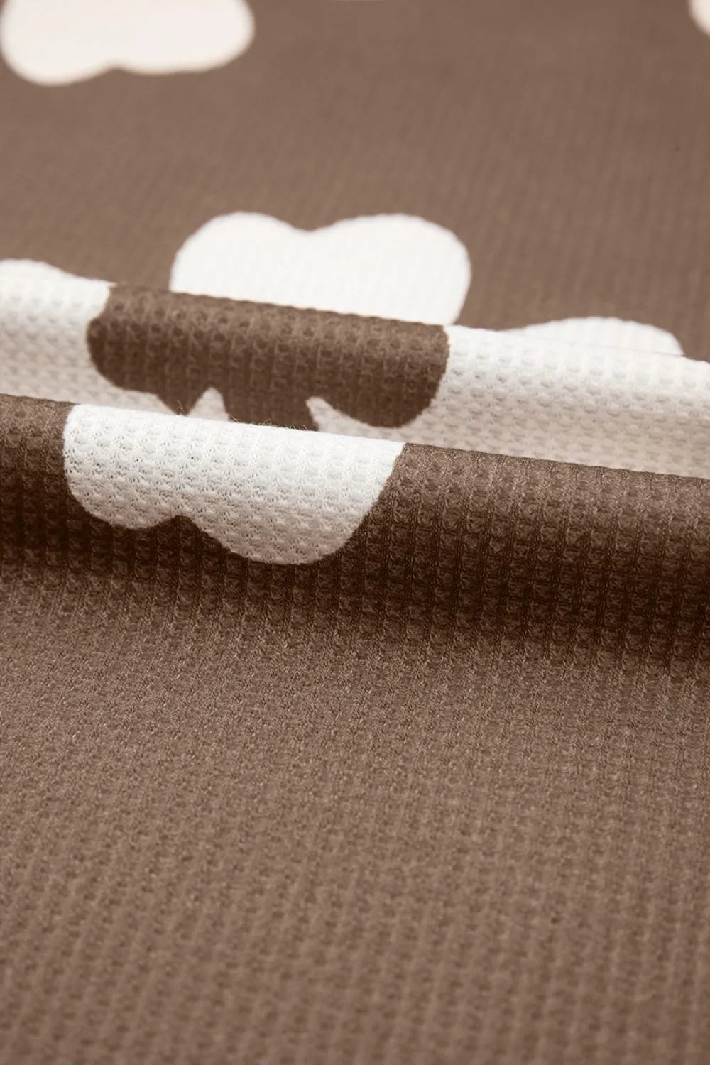 Floral Textured Ruffled Cap Sleeve Blouse.