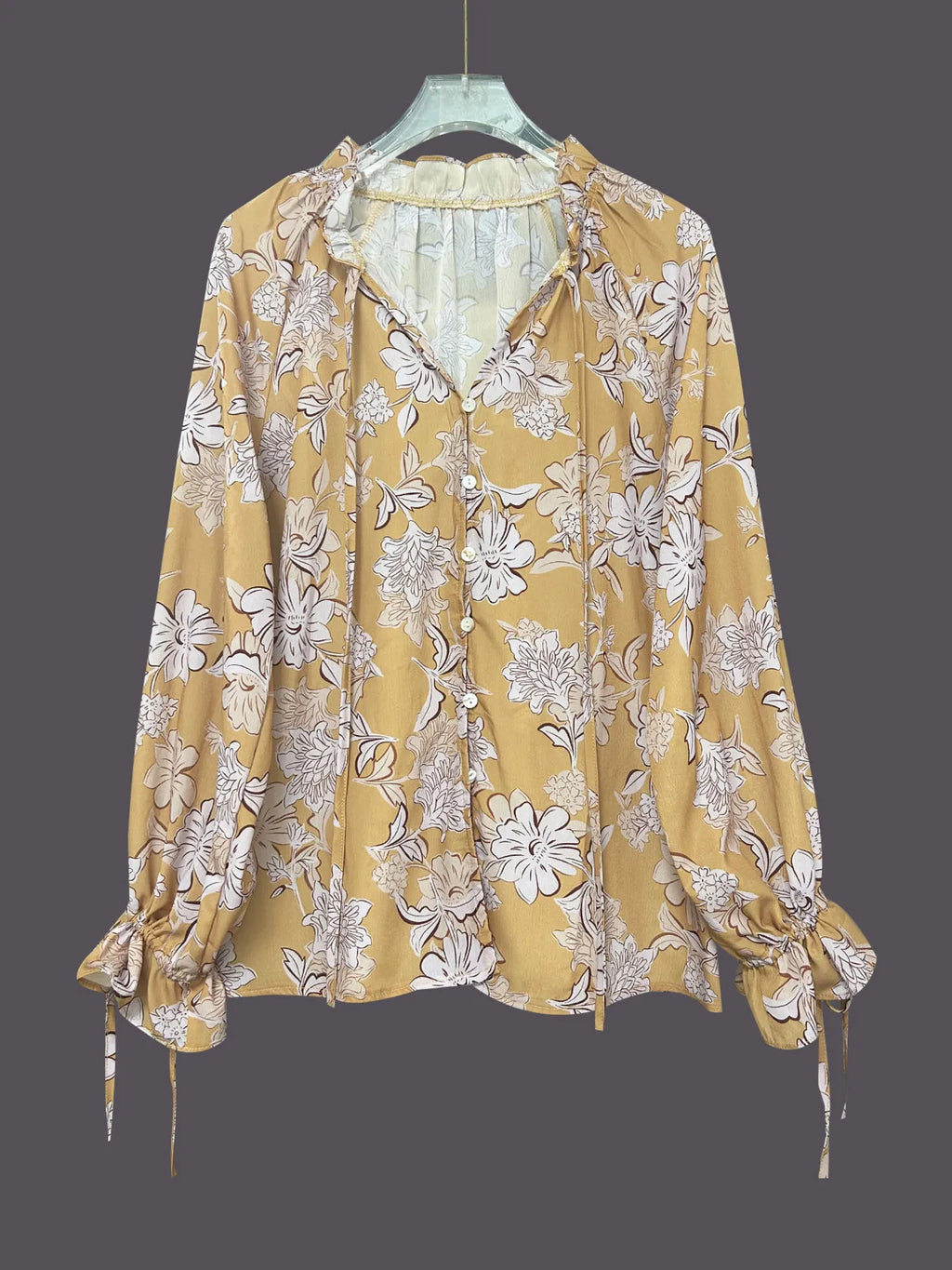 Printed Tie Neck Flounce Sleeve Blouse.