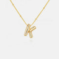 Gold-Plated Bubble Initial Necklace.