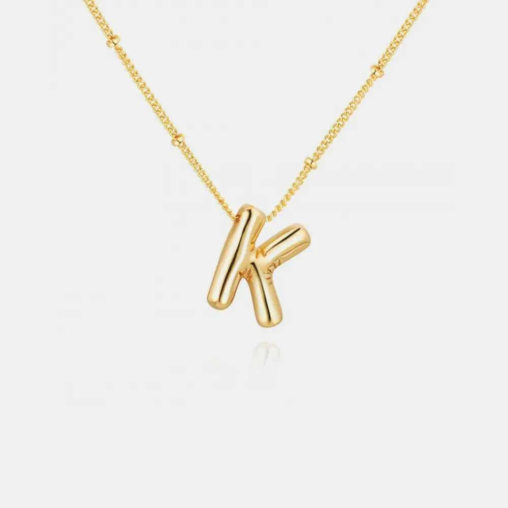 Gold-Plated Bubble Initial Necklace.