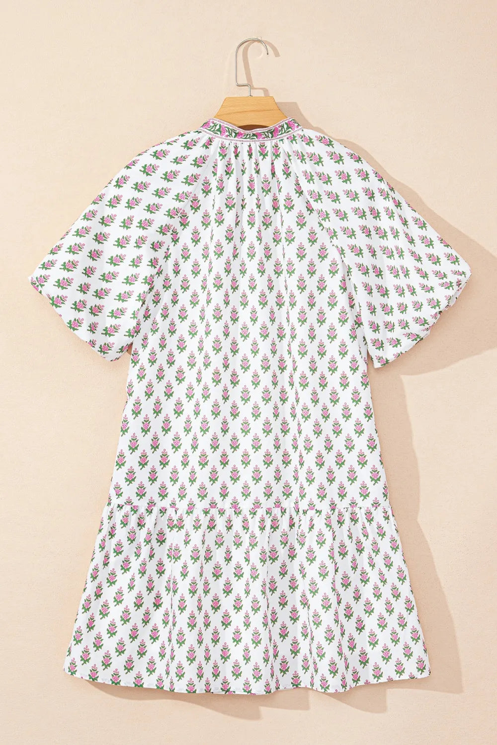 Puff Sleeve Tie Neck Ruffled Hem Dress.