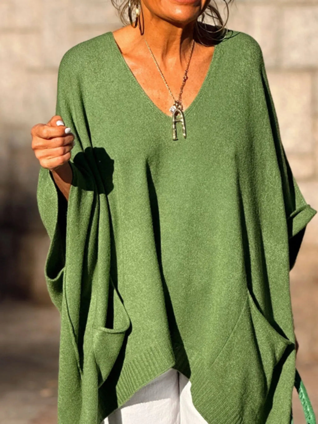 Ribbed Hem V-Neck Sweater.