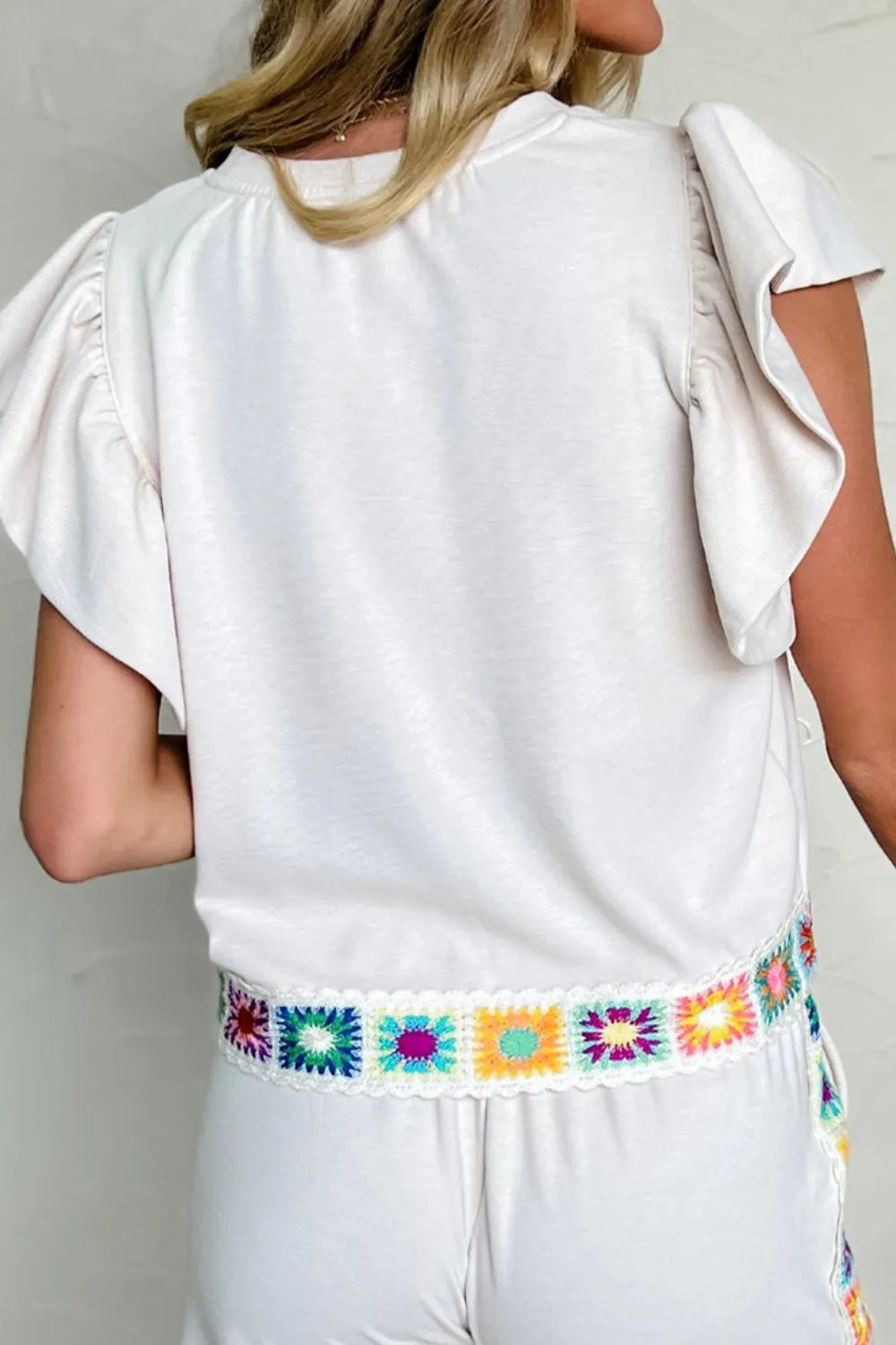 Floral Crochet Patched Ruffled Sleeve Crewneck Blouse.