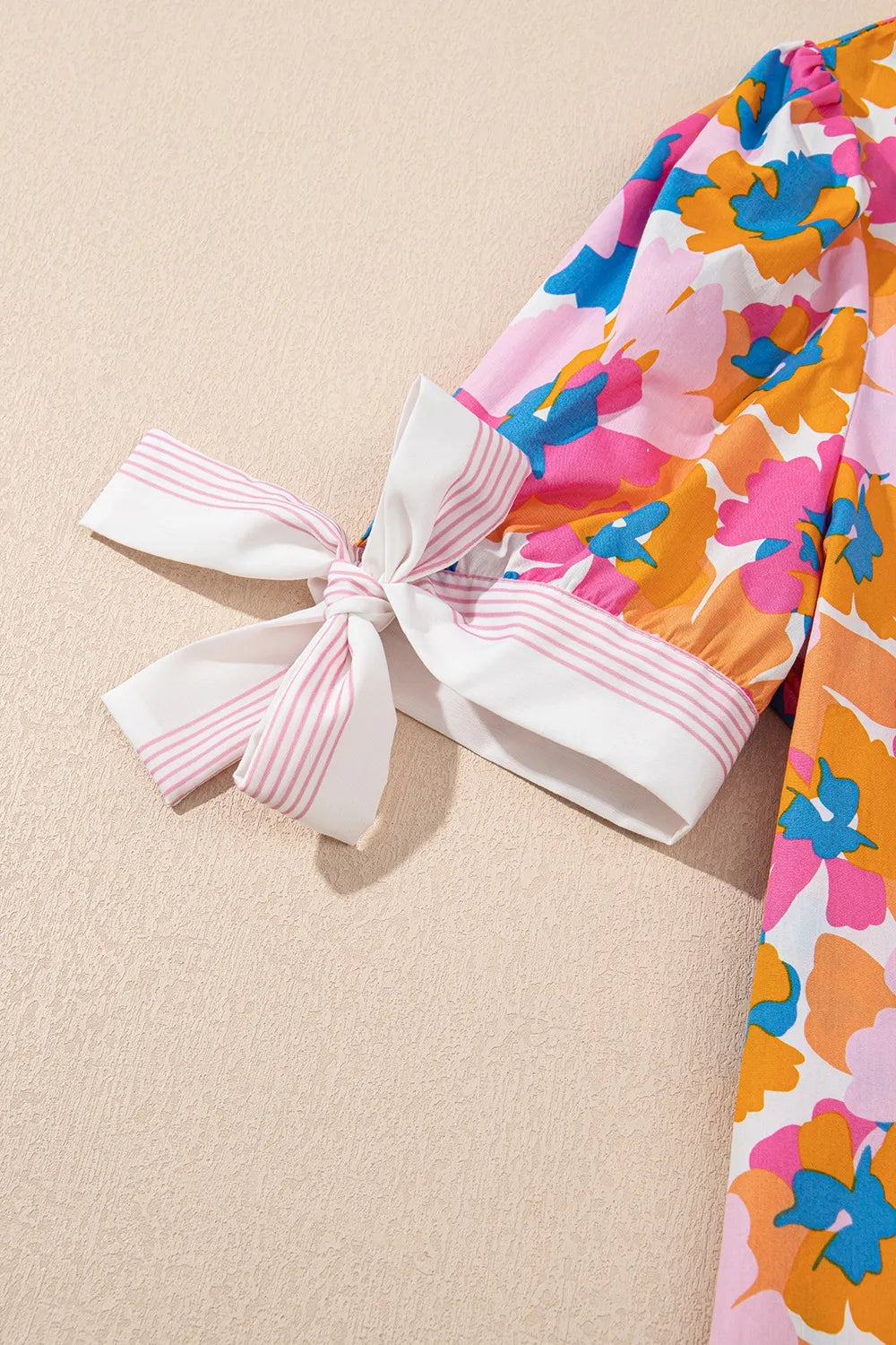 Floral Striped Edge V Neck Knotted Short Sleeve Blouse.