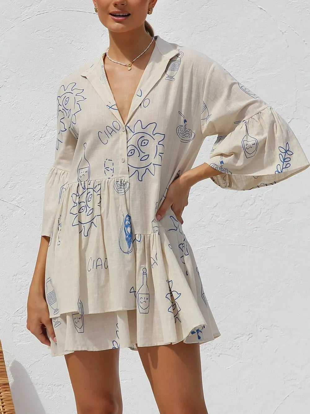 Button Detail Printed Mini Dress.