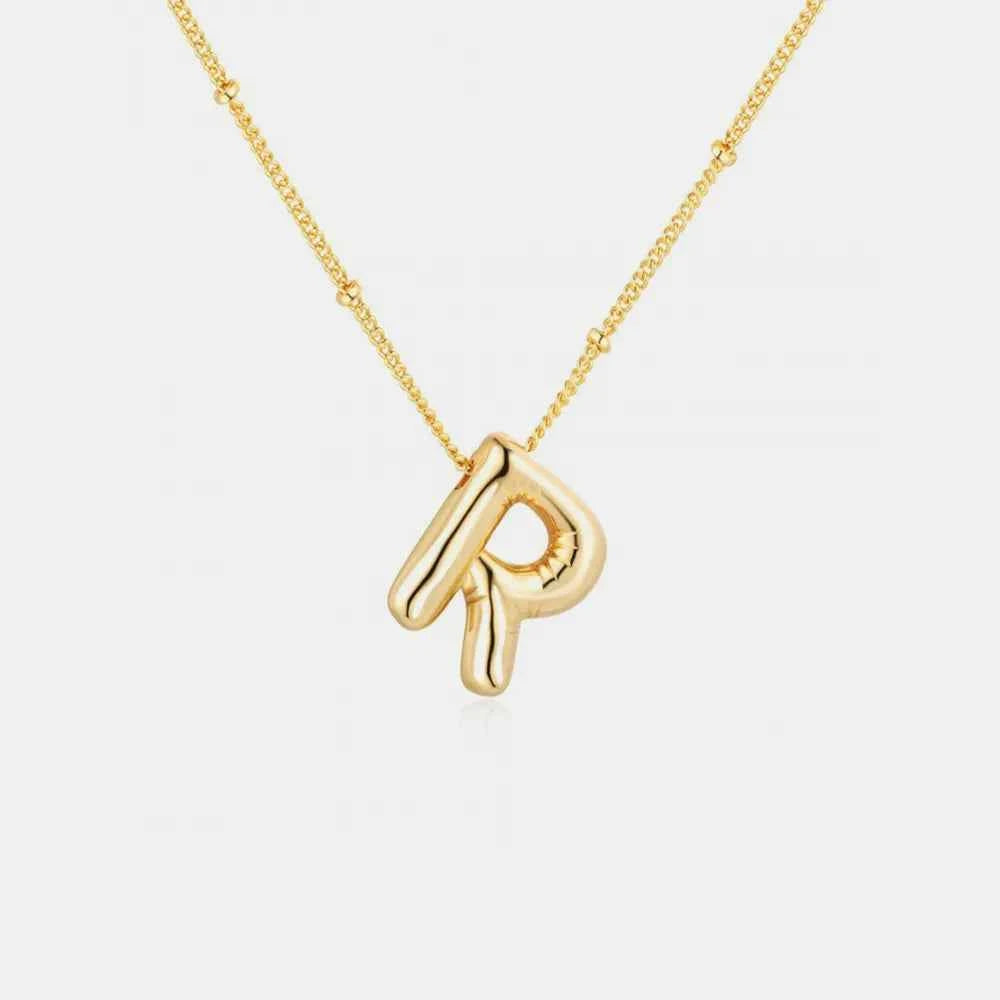 Gold-Plated Bubble Initial Necklace.