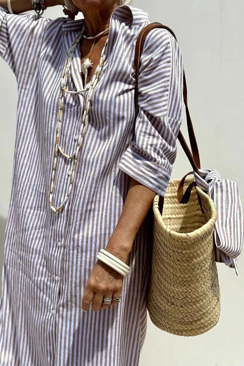 Tied Button Up Three-Quarter Sleeve Dress.