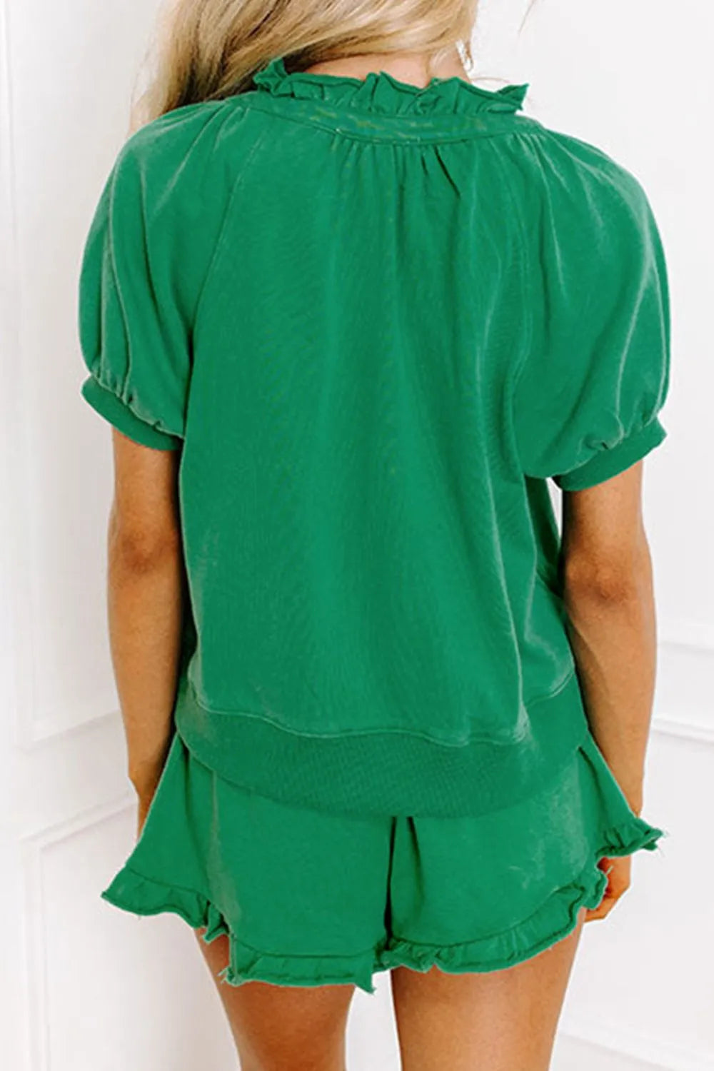 Frill Zip Front Puff Sleeve Top and Skort Set.