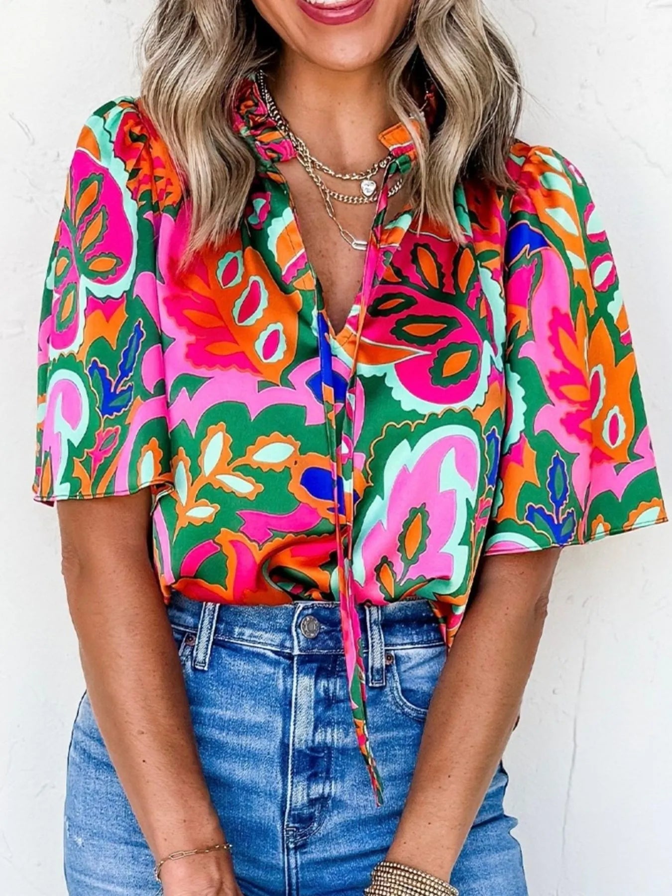 Tropical Print Short Sleeve Tie Neck Blouse.