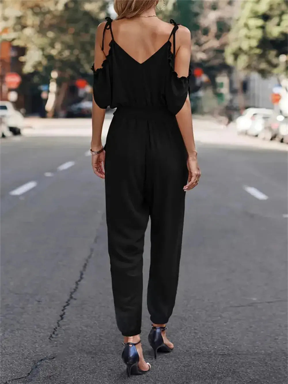 Surplice Tied Spaghetti Strap Jumpsuit.