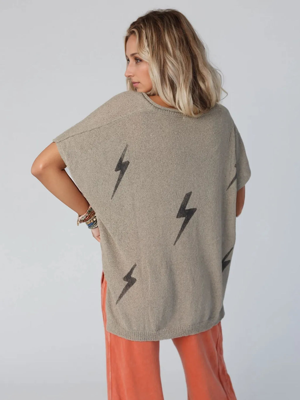 Lightning V-Neck Short Sleeve Knit Top.
