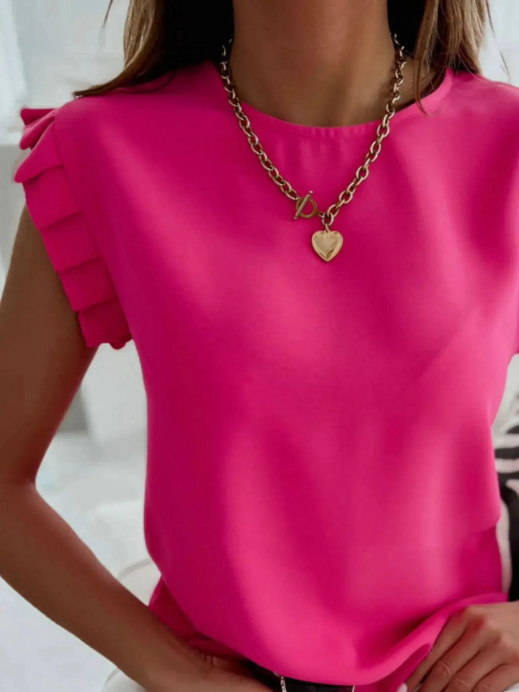 Ruffled Round Neck Cap Sleeve Top.