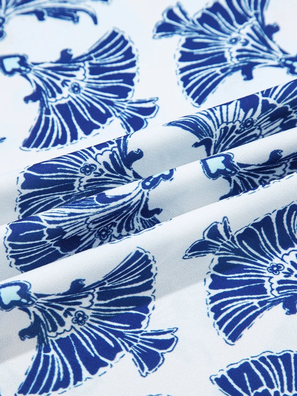 Printed Tassel Tie Neck Blouse.