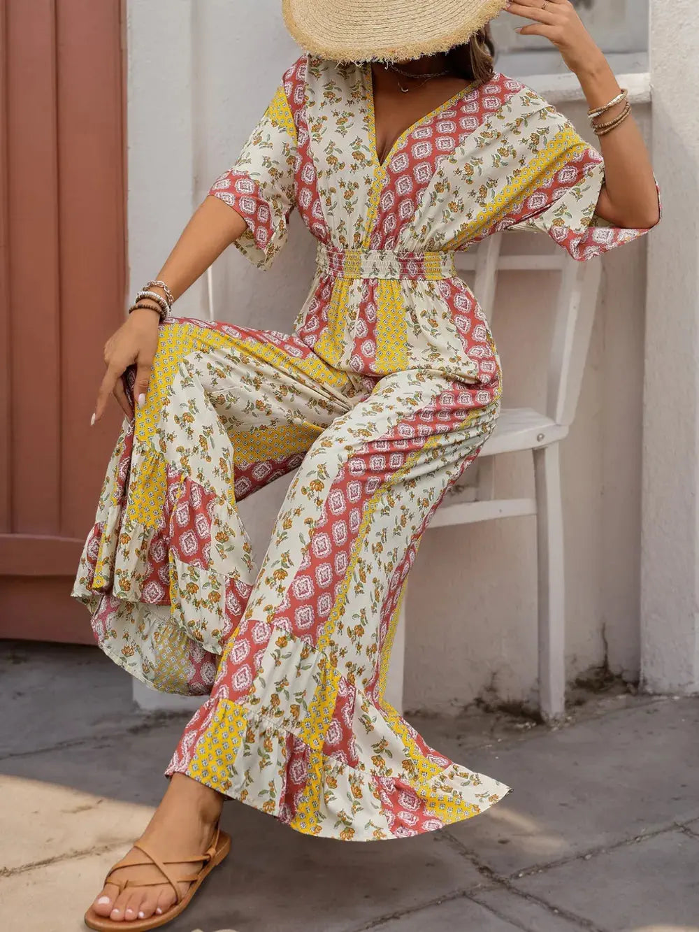 Perfee Ruffled Hem Printed V-Neck Jumpsuit.
