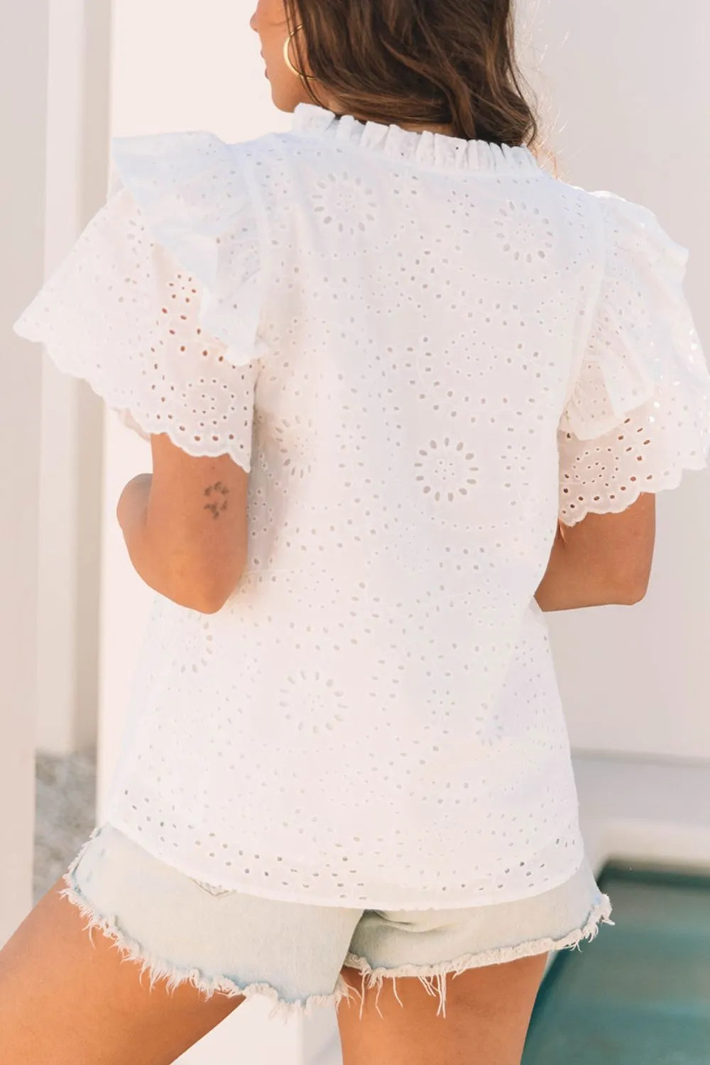 Eyelet Notched Short Sleeve Blouse.