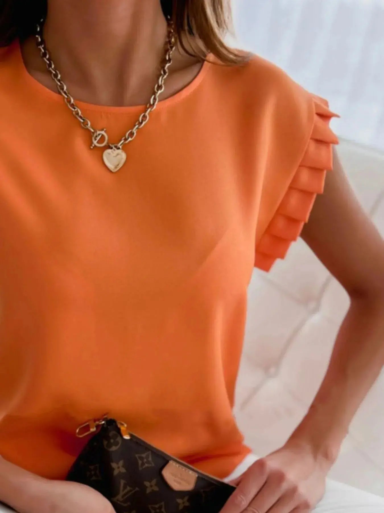 Ruffled Round Neck Cap Sleeve Top.