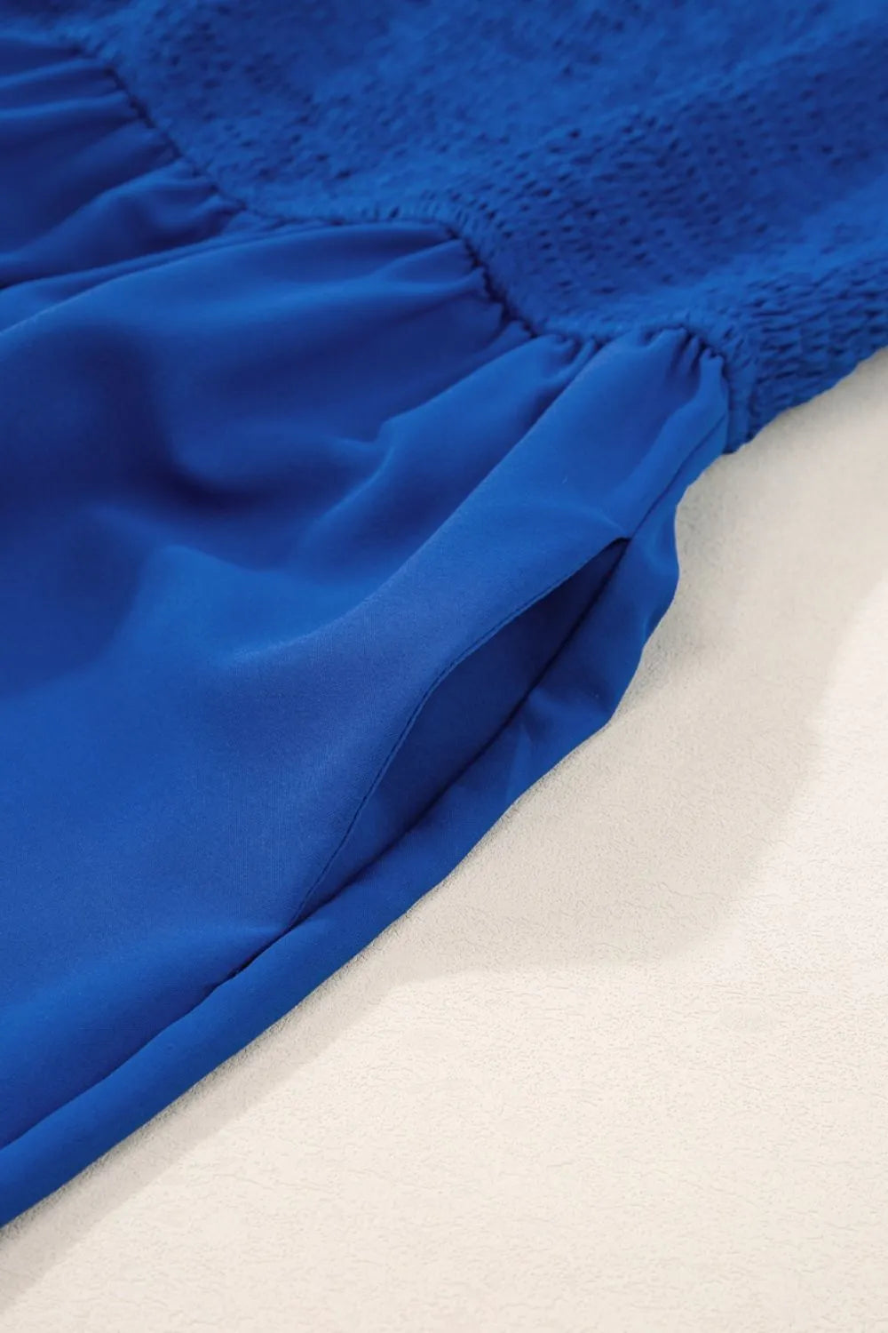 Spaghetti Straps Smocked Ruffled Wide Leg Jumpsuit.