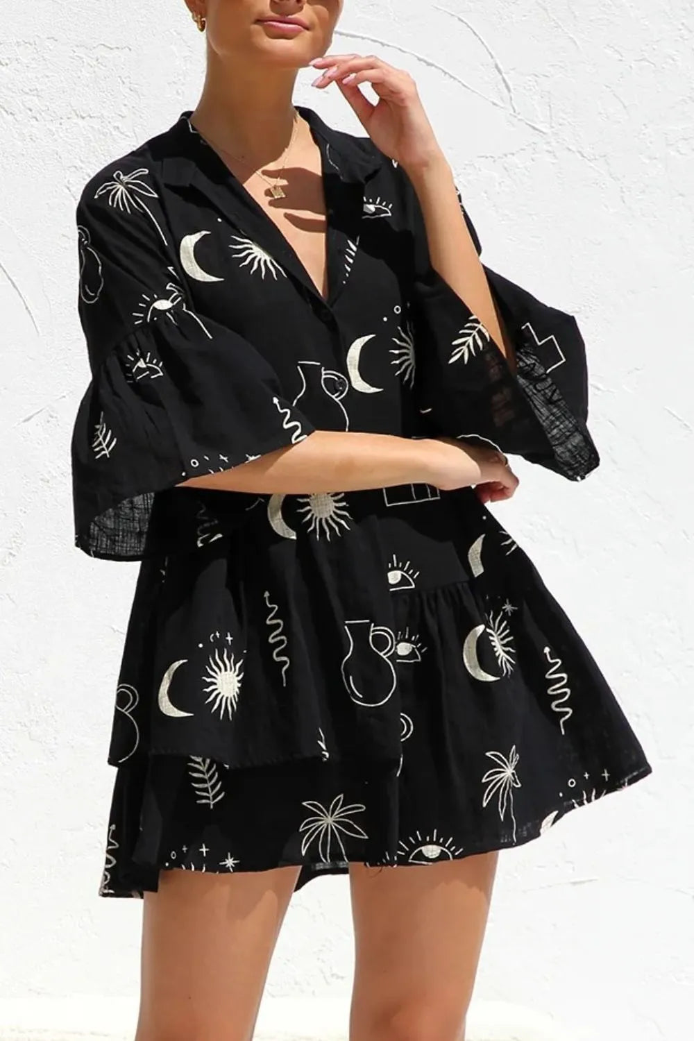 Ruched Printed Three-Quarter Sleeve Mini Dress.