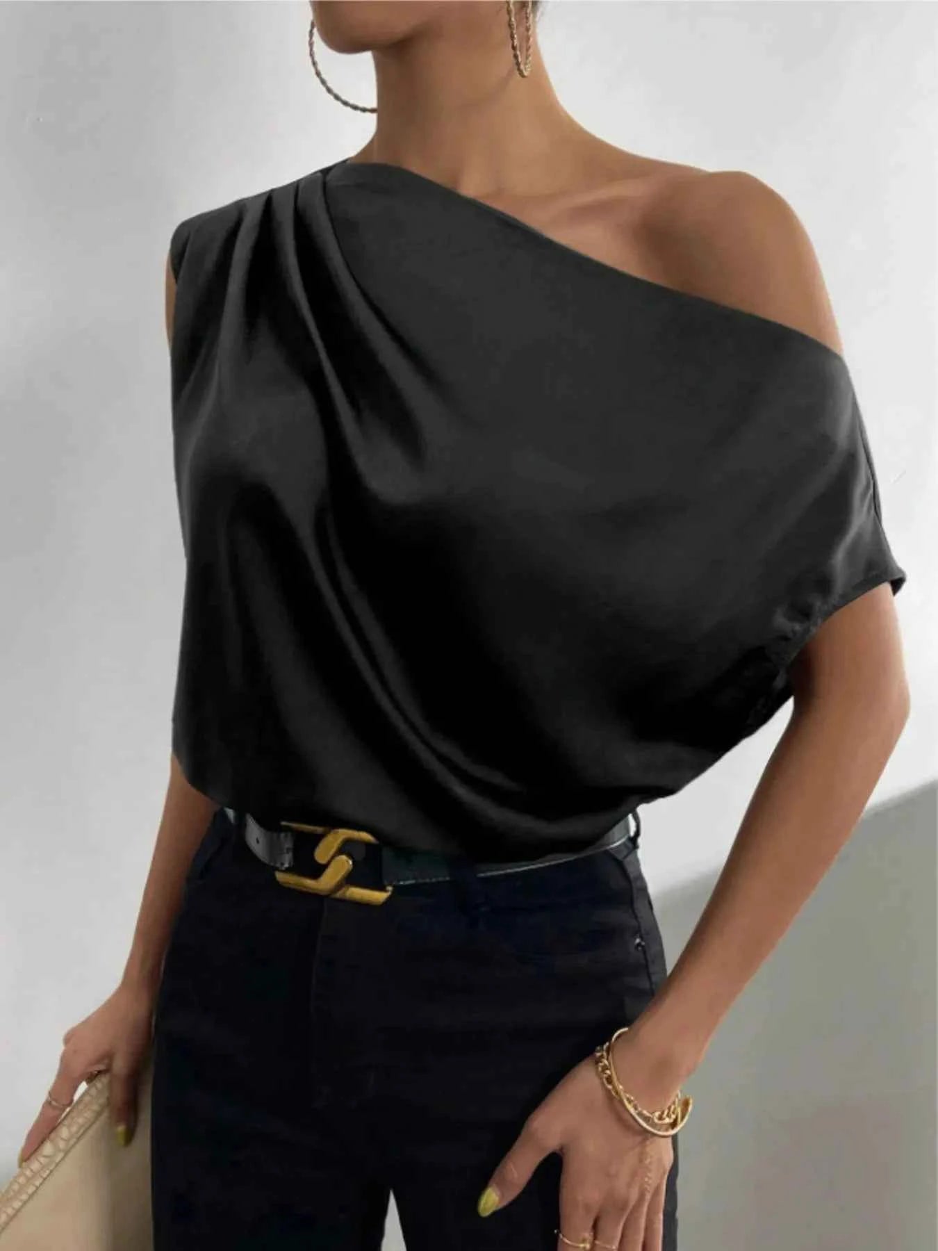 Asymmetrica One-Shoulder Draped Blouse.
