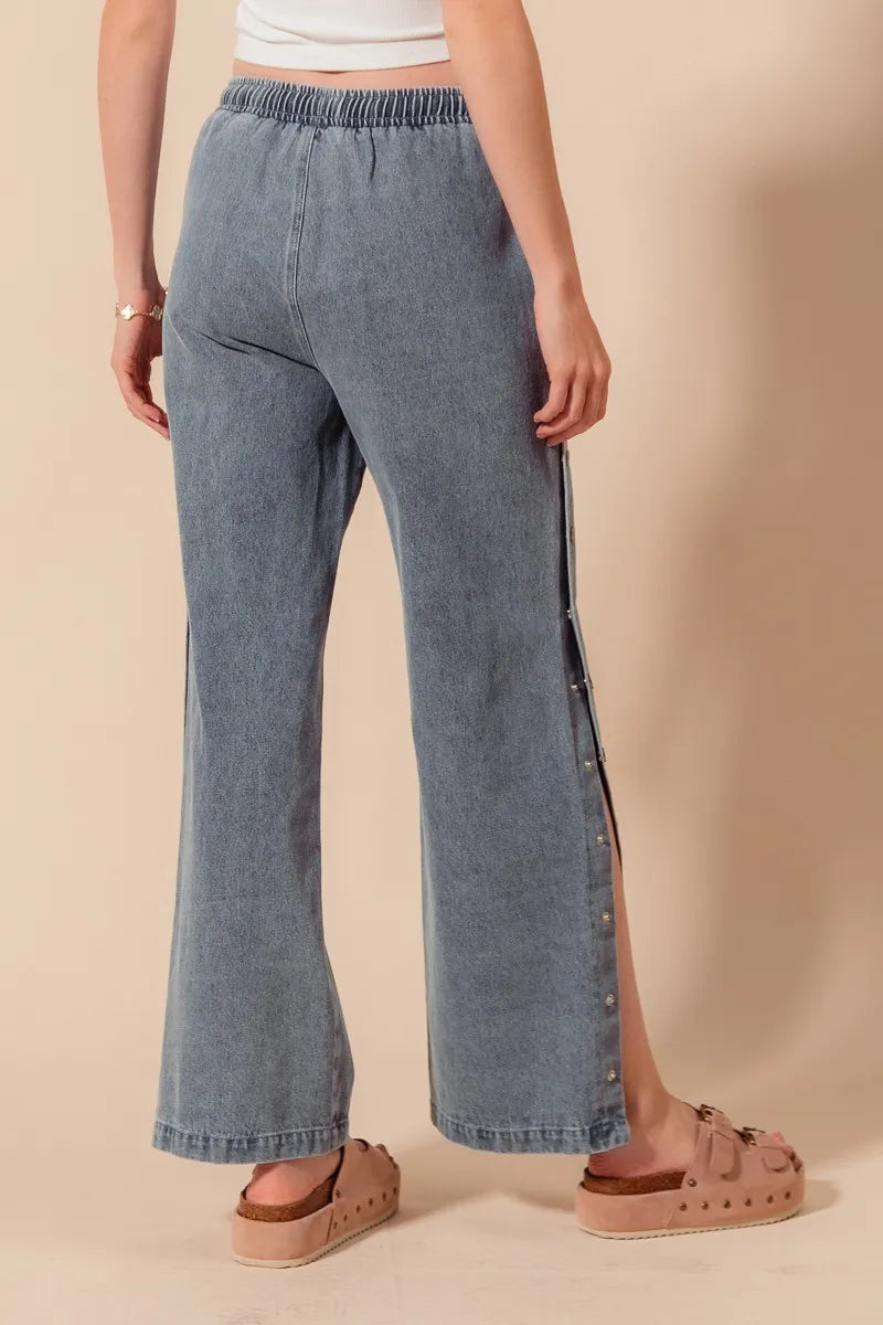 Mid Rise Drawstring Jeans with Side Snap Button.