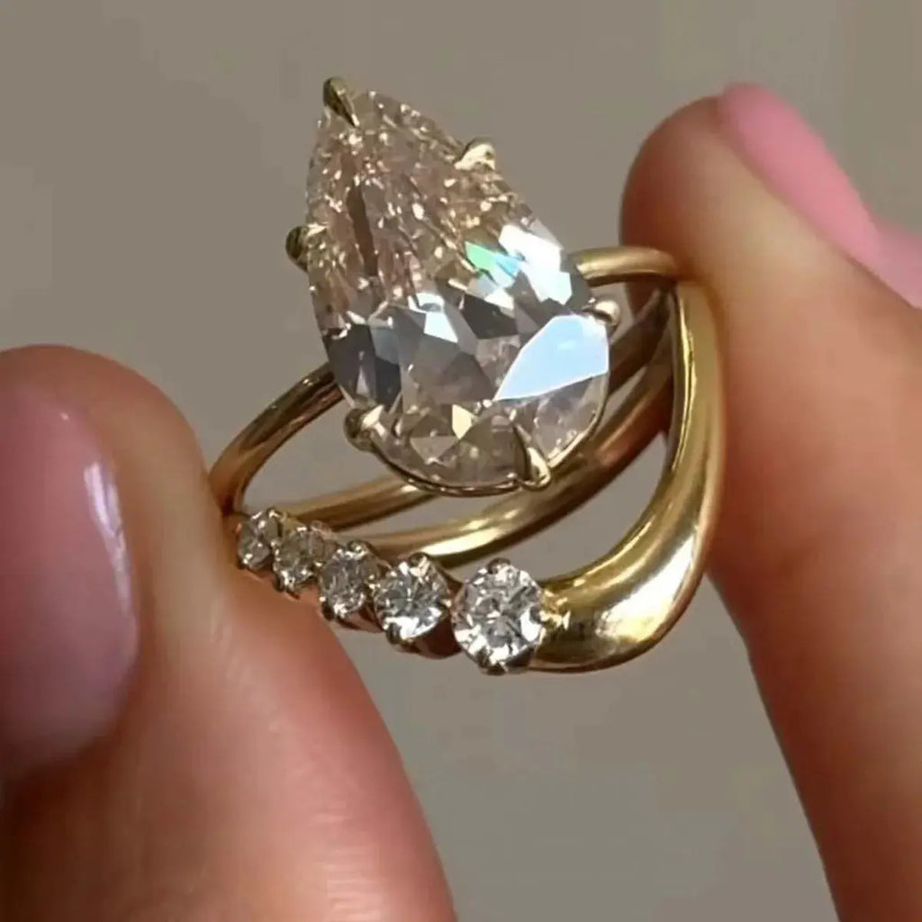 1.5 Carat Moissanite Teardrop Ring 2pcs Set.