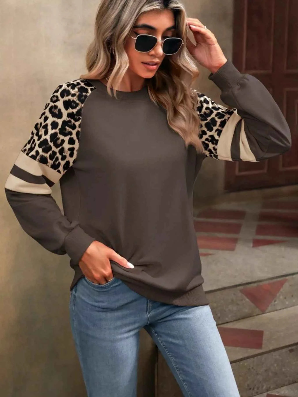 Leopard Round Neck Raglan Sleeve Sweatshirt.
