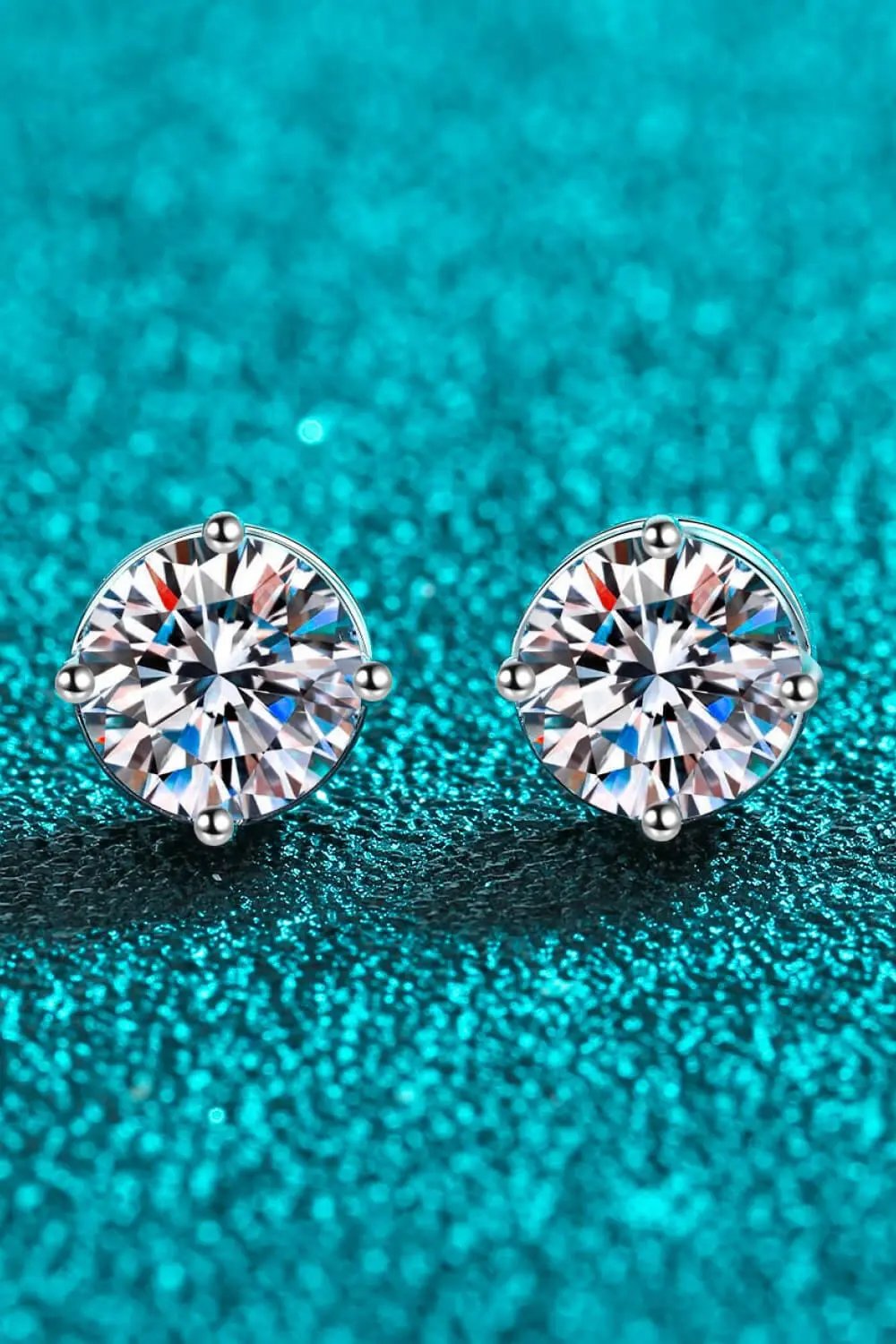 2 Carat Moissanite Rhodium-Plated Stud Earrings.
