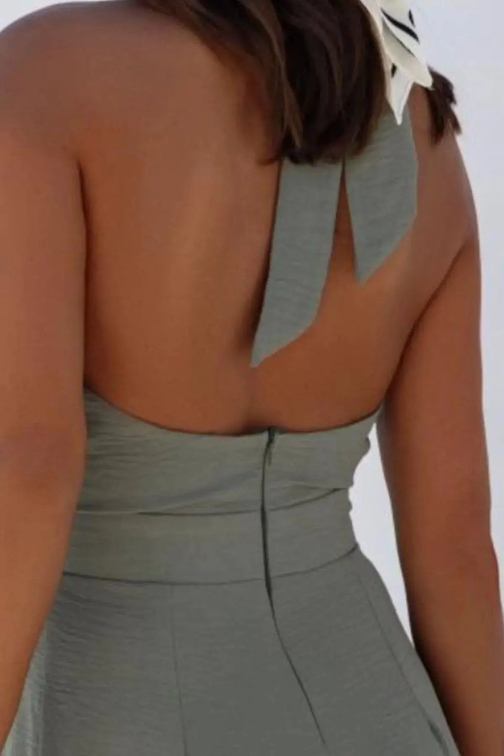 Halter Neck Wide Leg Jumpsuit with Keyhole Detail.