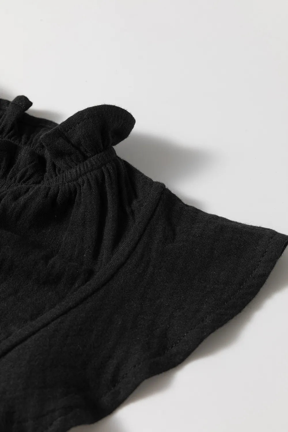 Ruffled Shoulder Notched Shift Tank Top.