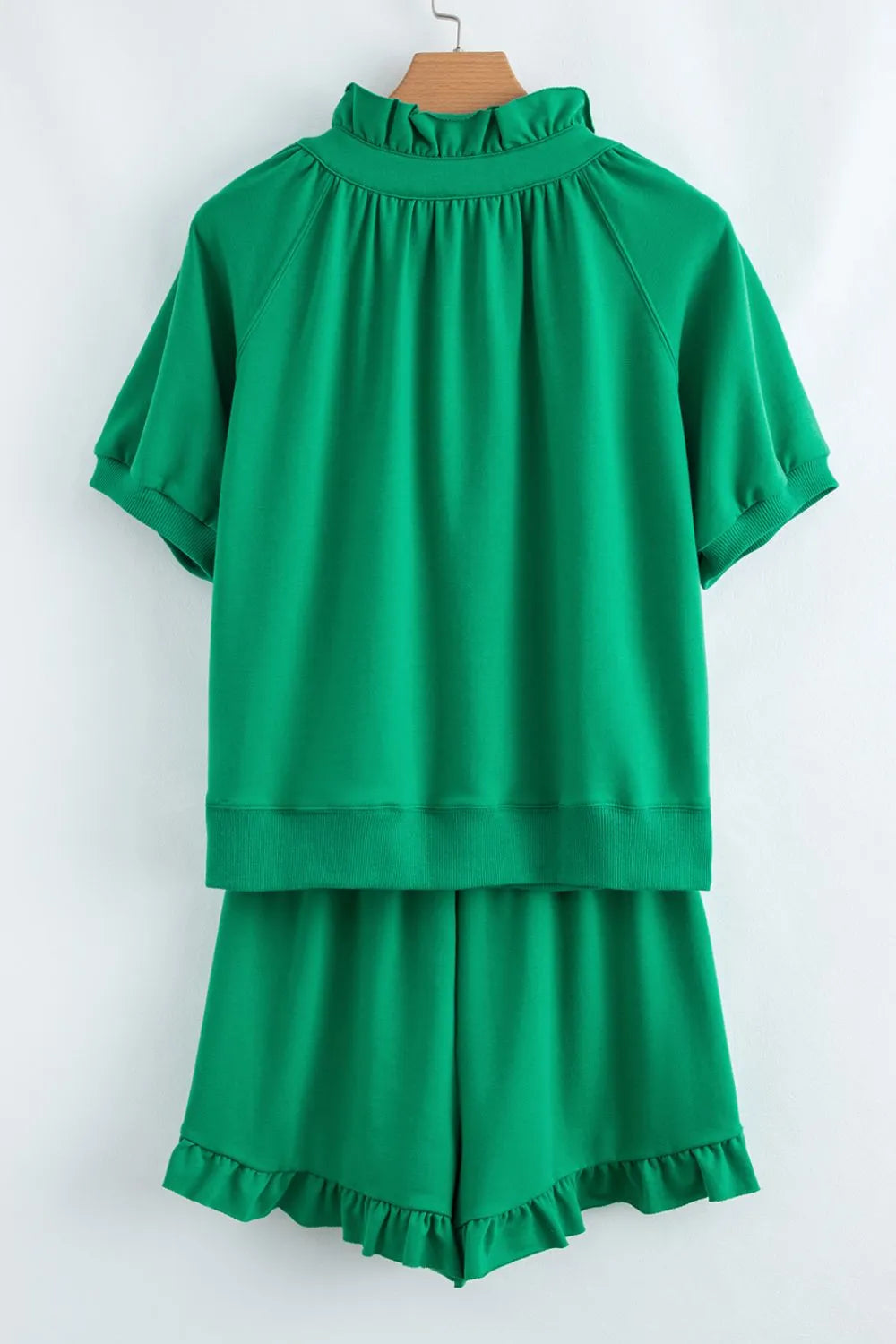 Frill Zip Front Puff Sleeve Top and Skort Set.